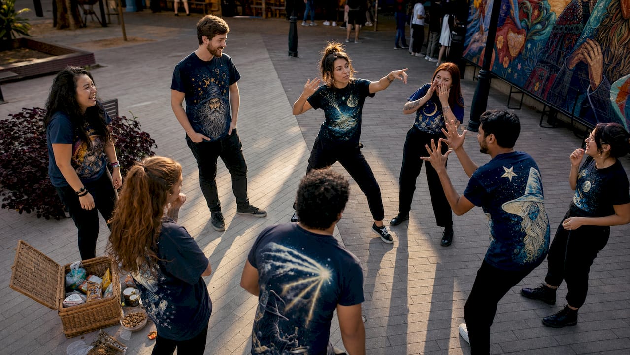 Group wearing themed clothing outdoors in park