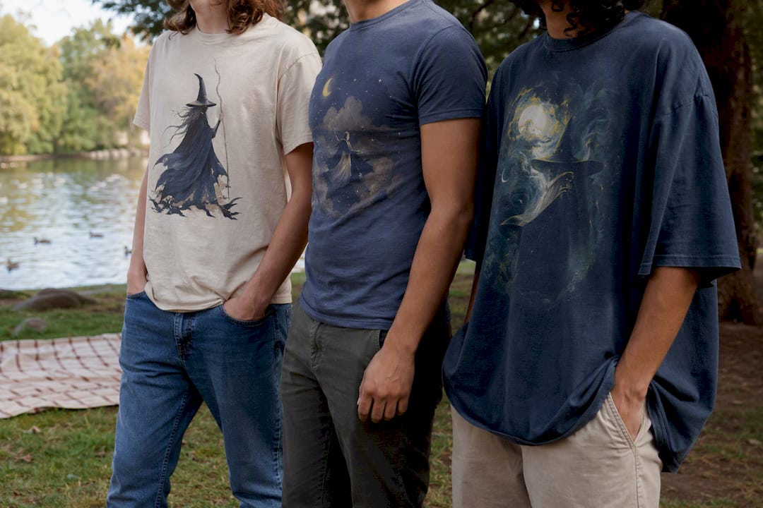 Three graphic tee fits on models mid-torso